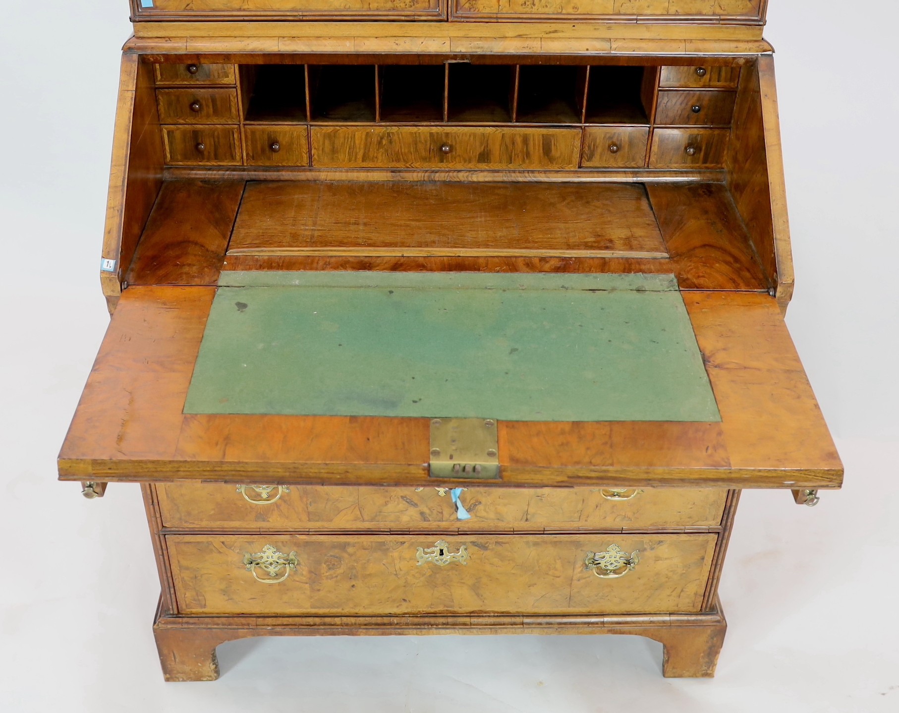 A George I walnut bureau bookcase, width 99cm, depth 62cm, height 196cm